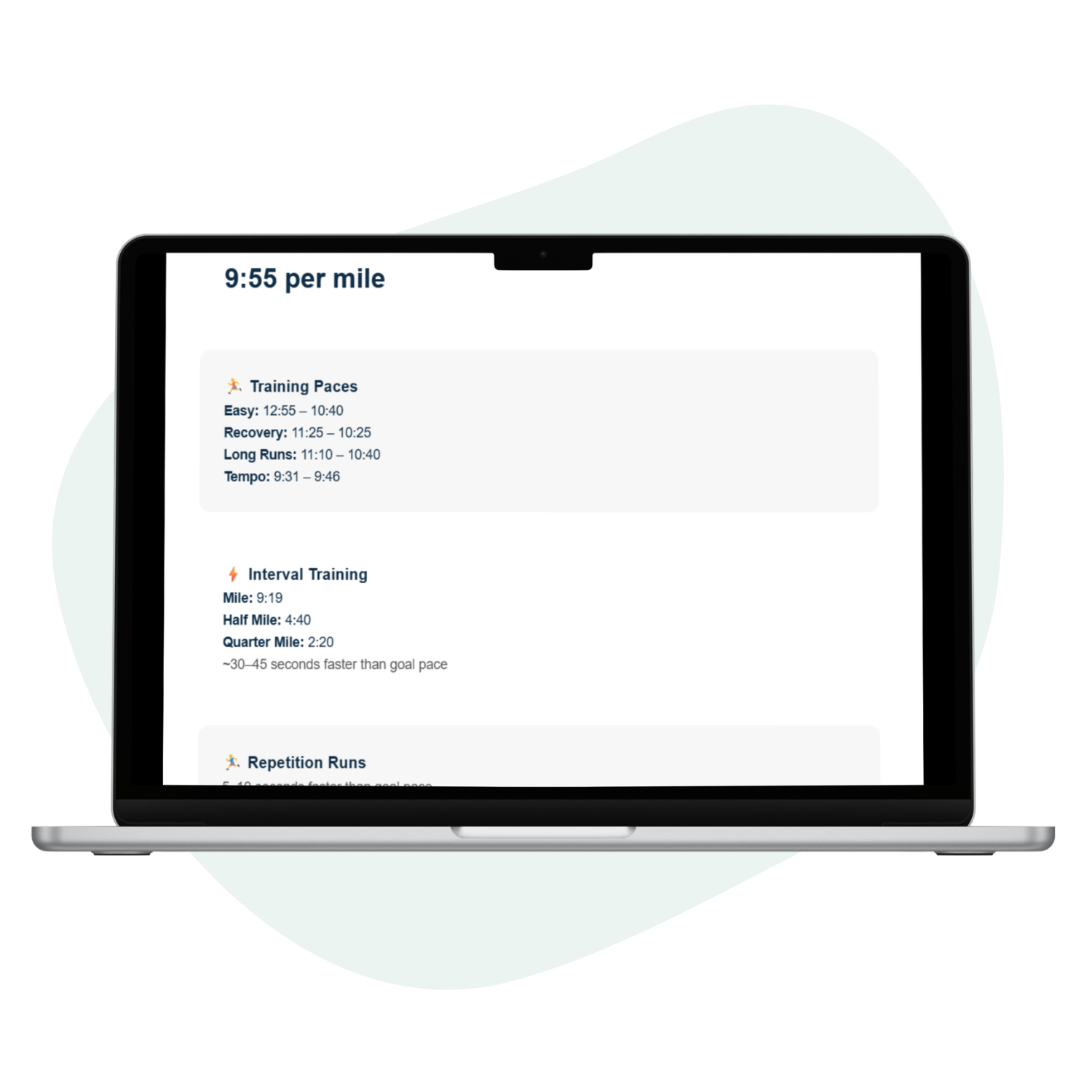 Laptop displaying a training pace chart on a white background